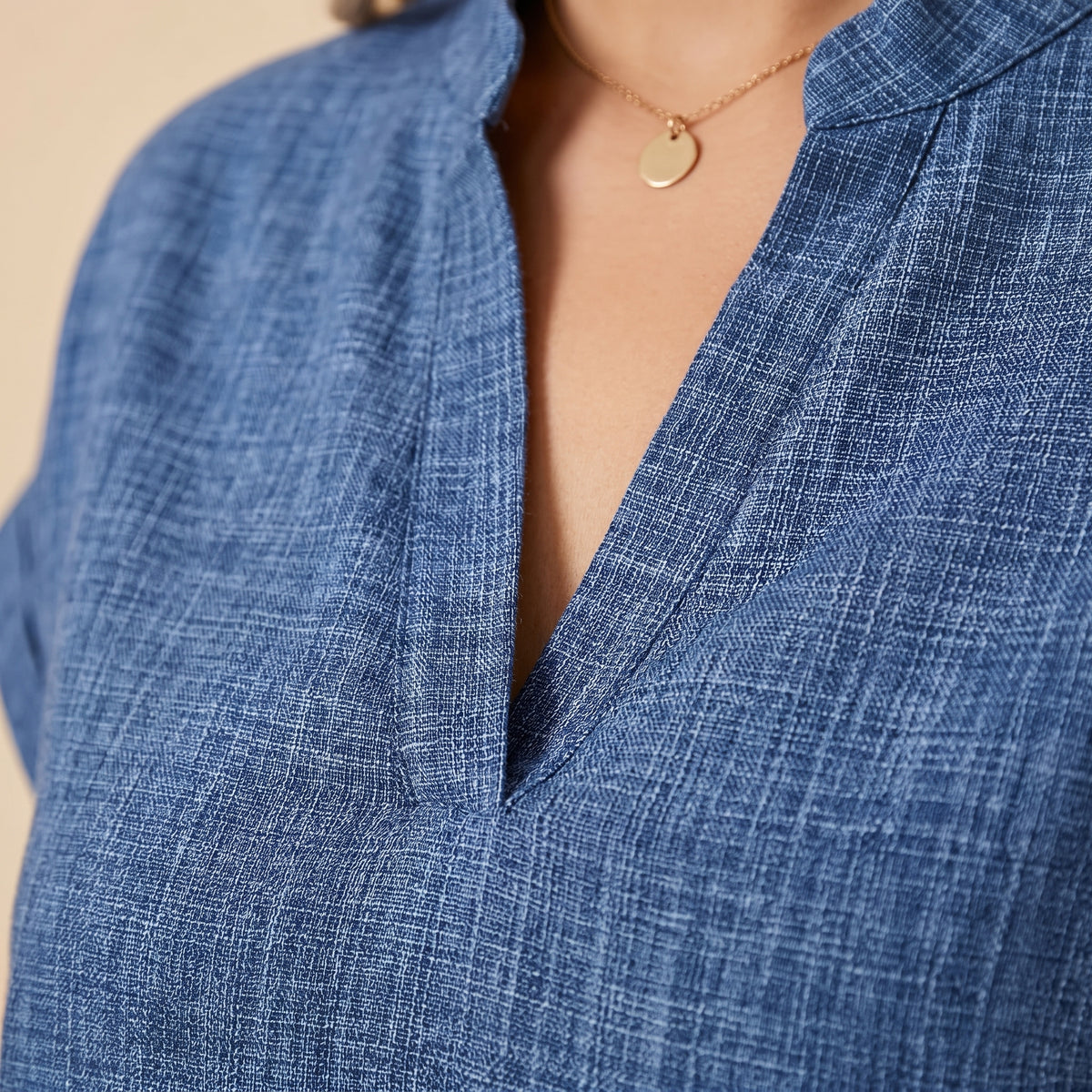 Blue blouse fabric detail