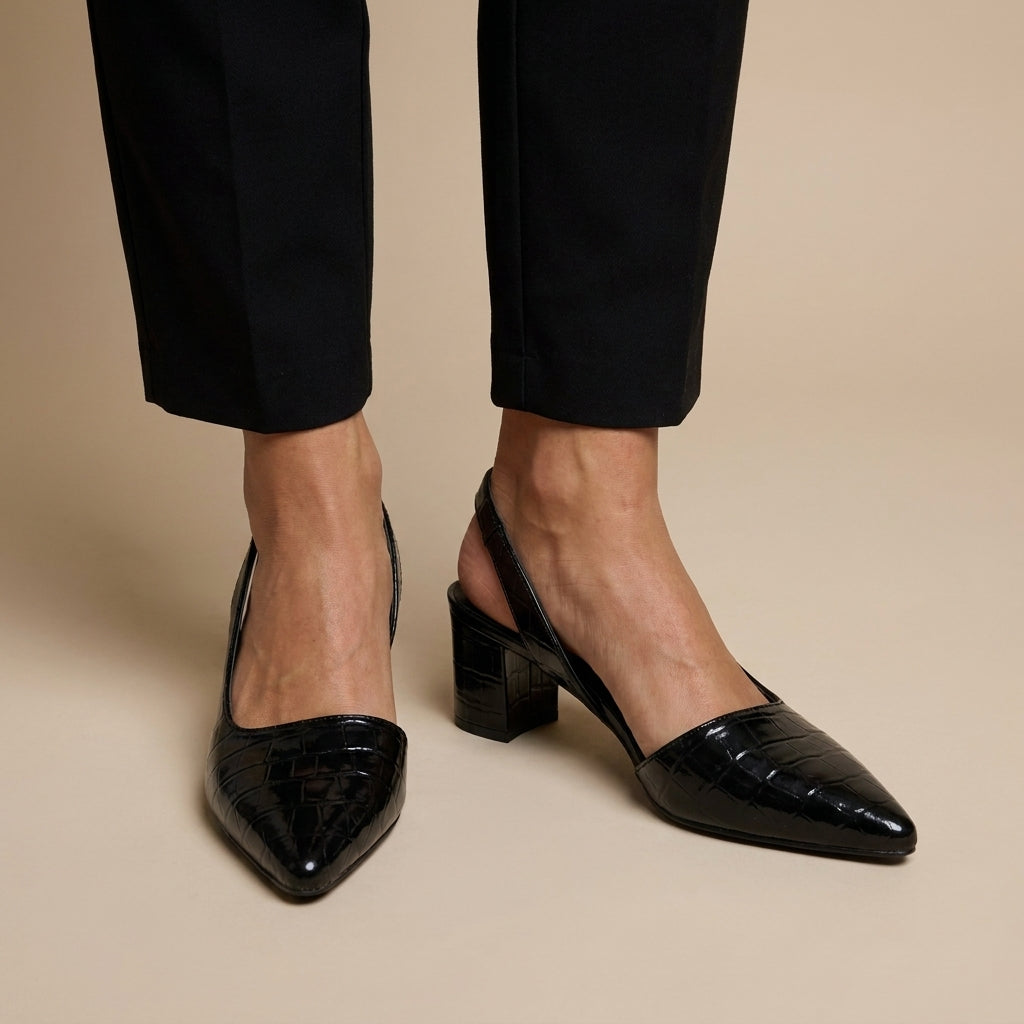 Zapatos negros en pie