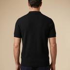 Polo negro vista trasera